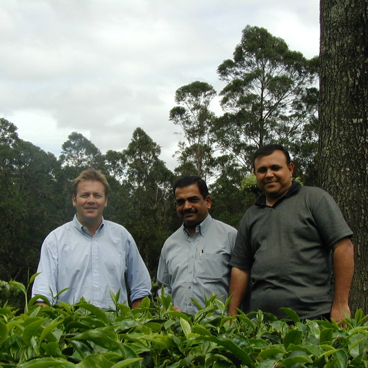 Three men standing together