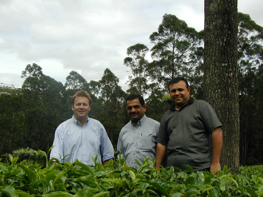 Three men standing together